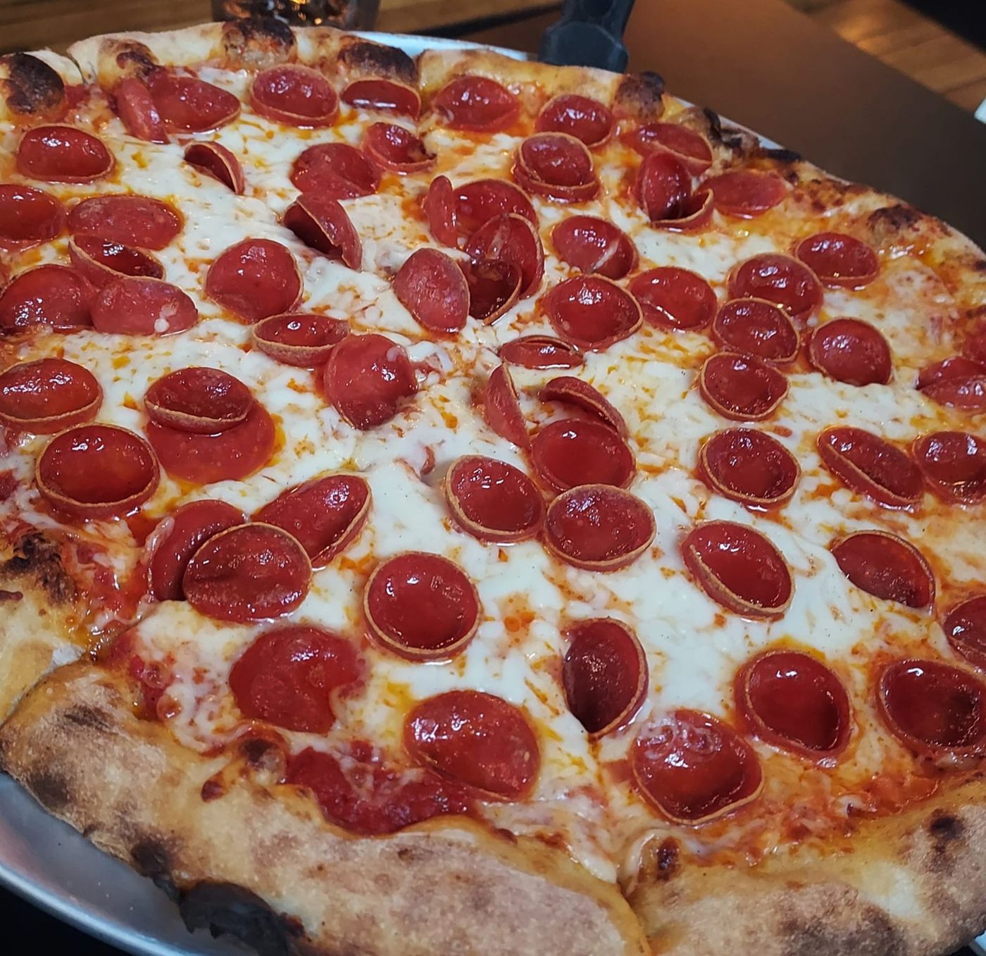 Wood-fired pepperoni pizza